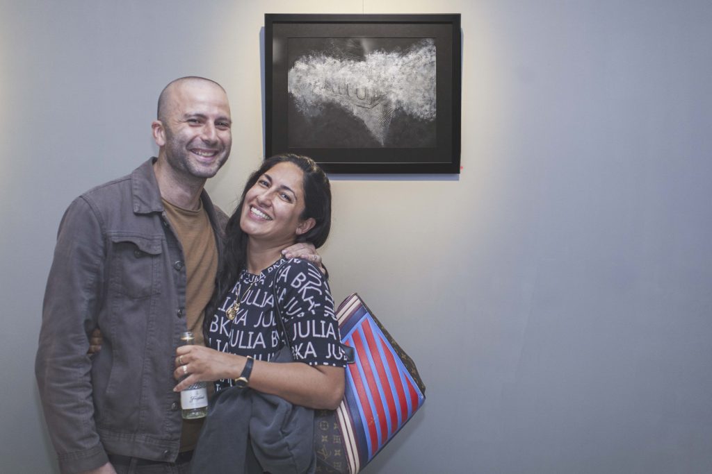Joanna Delia with the artist John Paul Azzopardi at his first exhibition of drawings at Lily Agius Gallery, 2021.